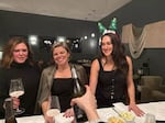 From the left Lauren Riker, Julie Parmer and Tracy Parmer enjoy a pour of French champagne at a club event at the Drayman House in Walla Walla, Wash., in an undated photo.