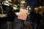 Anti-Trump demonstrator Jessica Radits held a sign that read “Love Still Exists Here,” as she marched in a November 9 2016 protest in downtown Portland.