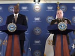 U.S. Secretary of Defense Lloyd Austin, left, listens as Chairman of the Joint Chiefs of Staff Army Gen. Mark Milley discusses the downed MQ-9 drone during a press conference at the Pentagon on Wednesday.