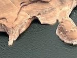 This photo provided by the National Park Service shows the Double Arch after it collapsed last week in the Glen Canyon National Recreation Area in southern Utah.