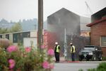 Workers at CDL Recycle in the Seattle neighborhood of Georgetown. It's been the subject of complaints by neighbors who say it's putting out too much dust.