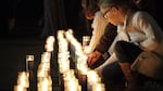 Roseburg community members held a vigil Thursday night for the victims of a shooting at Umpqua Community College earlier in the day.