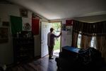 Jose Martinez stands in his home in Sunnyside, Wash., on June 13. His lawsuit against an area dairy farm led to the establishment of overtime rules for farmworkers in Washington state.