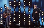 Tracy Chapman (left) and Luke Combs perform onstage during the 66th Grammy Awards on February 04, 2024 in Los Angeles, California. Combs's had a hit last year with his cover of Chapman's "Fast Car," which itself was nominated for song and record of the year in 1989.
