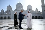 Yousif al-Obaidli, the director general of the Sheikh Zayed Grand Mosque, accompanies President Trump on a tour of the mosque in Abu Dhabi on May 15, 2025.