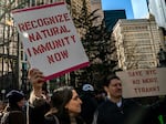 People gather at City Hall to protest New York City's vaccine mandate for public employees on February 11, 2022, the day that many were fired.