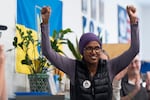 Washington County Chair candidate Nafisa Fai reacts as people applaud before a canvassing event.