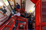 Voters wait in a long line down a spiral staircase before the polls open at 7 a.m. at the Charlestown Boys and Girls Club in Boston, Mass.