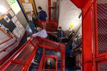 Voters wait in a long line down a spiral staircase before the polls open at 7 a.m. at the Charlestown Boys and Girls Club in Boston, Mass. 