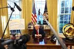President Trump speaks to the press next to a map of the "Gulf of America" in the Oval Office of the White House on March 26. The administration has denied the Associated Press access to some news events because it uses the term "Gulf of Mexico."