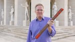 Rick holding a fasces at the Palace of Italian Civilization in the E.U.R. district of Rome