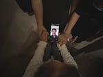 Marooned in Thailand, Gao's family video-calls him thousands of miles away in the Netherlands.