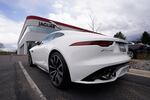 FILE - An unsold 2021 F-Type coupe sits at a Jaguar dealership in this photograph taken Sunday, May 2, 2021, in Littleton, Colo.
