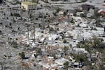 Damaged homes and debris are shown in the aftermath of Hurricane Ian on Sept. 29, 2022, in Fort Myers, Fla.