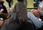 Aelina, 22, and Ramani, 20, hang out in the salon.