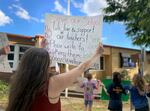 Parents and students concerned about staffing changes rally outside Valley Inquiry Charter School in Salem, Ore., before a board meeting on May 13, 2024.