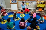 Family educator Lisa Benson-Nuyen addresses her students in a circle in the Northern Lights classroom at the Meadow Lakes CCS Early Learning, a Head Start center, in Wasilla, Alaska in 2024. The center has since closed because of a lack of staff and money.