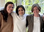 Elaine Kelsey, left, her child, Lior Onaly-Kelsey, center, and attorney Caitlin Mitchell, right, celebrate in Eugene, Ore., in Sept. 2023, after a federal jury concluded Greater Albany Public Schools and a former principal violated the U.S. Constitution, Title IX and Oregon law by discriminating against Onaly-Kelsey for their gender identity.