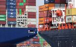 President Trump called for additional taxes on imported products Thursday, saying U.S. tariffs should be as high as those in other countries. The U.S. ran a trade deficit of $918 billion last year.