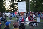 FILE - In this undated provided photo, fans cheer for the Portland Cherry Bombs FC, a pre-professional women’s soccer team in the USL W League. The Cherry Bombs are in their first season and play home games at Lents Park. 