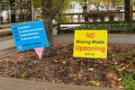 Dueling signs dot Virginia's Arlington County as residents debate the zoning reform proposal. This photo first appeared in DCist. Click here to read that story.