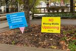 Dueling signs dot Virginia's Arlington County as residents debate the zoning reform proposal. This photo first appeared in DCist. Click here to read that story.