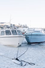 Ships frozen in sea ice in Ilulissat Harbor on Feb. 18, 2025.