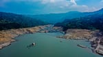 Forecasters are warning that a new El Niño weather pattern could bring strong impacts to areas around the world. In this 2024 photo, dramatically low water levels are seen in a reservoir feeding the Guavio Hydroelectric Power Plant in Gachalá, in Colombia's Guavio Province, during dry conditions linked to El Niño.