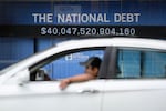 The federal debt topped $40 trillion for the first time this week. Investors who buy government bonds are demanding higher interest rates to finance that growing debt load.