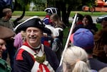 Joel Simmons, wearing a replica Revolutionary War uniform, greets visitors at the Oregon State Capitol on June 27, 2026.