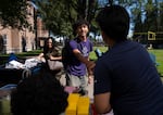 University of Portland freshman Charles Sanchez meets fellow students while moving into his dorm.