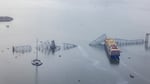 An aerial view of the cargo ship Dali after it ran into and collapsed the Francis Scott Key Bridge on March 26, 2024 in Baltimore, Maryland.