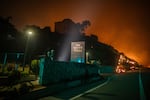 Flames from the Palisades Fire reach the grounds of the Getty Villa Museum on the Pacific Coast Highway amid a powerful windstorm on Jan. 8, 2025 in Los Angeles, Calif.