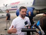 Republican vice presidential nominee Sen. JD Vance (R-Ohio) speaks to reporters before he departs Pitt-Greenville Airport following a campaign event in Greenville, N.C. on Saturday.