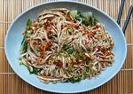 Noodles in a blue dish.