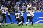 The Baltimore Ravens celebrate after kicker Justin Tucker hit a game-winning 66-yard field goal during a game in 2021. That field goal still stands as the longest ever in the history of the NFL.