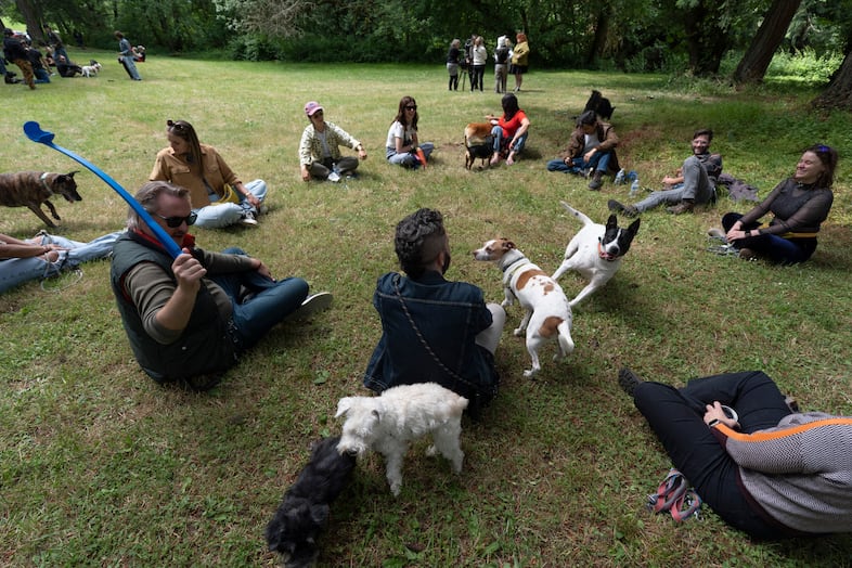 Participants form a circle as they wait to be interviewed.