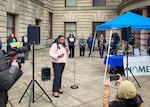 Portland City Councilor Candace Avalos speaks at a rally outside of City Hall on December 3, 2025. Avalos is one of three councilors calling for a new spending plan on programs that could keep people from becoming homelessness.