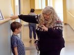 Earl Boyles Elementary teacher Vickie Saula talks to a student on Jan. 24, 2025. Saula is retired, but continues to teach full-time. Saula taught the Class of 2025 in kindergarten.