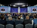 Russian President Vladimir Putin delivers his annual state of the nation address in central Moscow on Feb. 21. Putin hasn't pulled back on using "denazification" as his stated goal for the offensive in Ukraine.