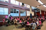 Middle school students eat lunch on their first day at Harriet Tubman Middle School in Portland, Ore., Aug. 26, 2025. 