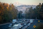 Cars travel along Interstate 5 through Portland, Ore., Friday, Nov. 1, 2019.