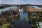 FILE - An aerial view of the Xochimilcol canals in Mexico City, Feb. 16, 2022.