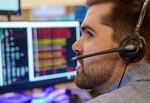 Joseph Stegemeyer takes a call at Portland’s Bureau of Emergency Communications, Dec. 13, 2022. Staff at the call center are trained to determine when to dispatch Portland Street Response as a non-police response to 911 calls involving people experiencing a possible mental health crisis.