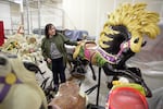 In a Portland warehouse March 28, 2023, Stephanie Brown admires one of the Jantzen Beach carousel horses that have been in storage for 11 years.