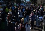 Demetria Hester, a local activist and organizer, leads chants during the 12th annual Reclaim Martin Luther King Jr. March on Jan. 19, 2026, in Portland, Ore., organized by Don’t Shoot PDX.