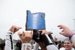 Central Catholic players hoist the trophy after winning the Oregon 6A football championship at Hillsboro Stadium in Hillsboro, Ore., Saturday, Dec. 7, 2019. Central Catholic defeated Lake Oswego 49-28.