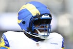Some professional players have begun wearing what's called a "guardian cap" in both practice and games. The cap is a soft covering that goes over the existing hard shell of the traditional helmet. The extra padding is thought to provide enhanced protection from heavy hits.