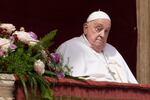 Pope Francis appears on the central lodge of St. Peter's Basilica to bestow the Urbi et Orbi (Latin for to the city and the world) blessing at the end of the Easter mass presided over by Cardinal Angelo Comastri in St. Peter's Square at the Vatican Sunday, April 20, 2025.  (AP Photo/Gregorio Borgia)