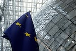 The European Union flag stands inside the atrium at the European Council building in Brussels, June 17, 2024.